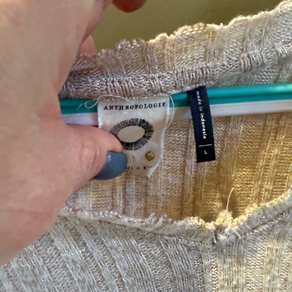 Light brown, lightweight, comfy sweater from Anthropologie. Machine wash.